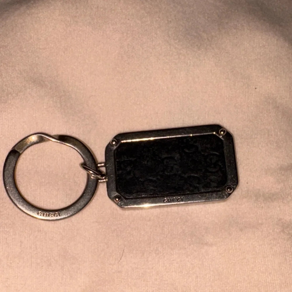 Black leather gg embossed guccissima Silver Keychain mens or womens as is